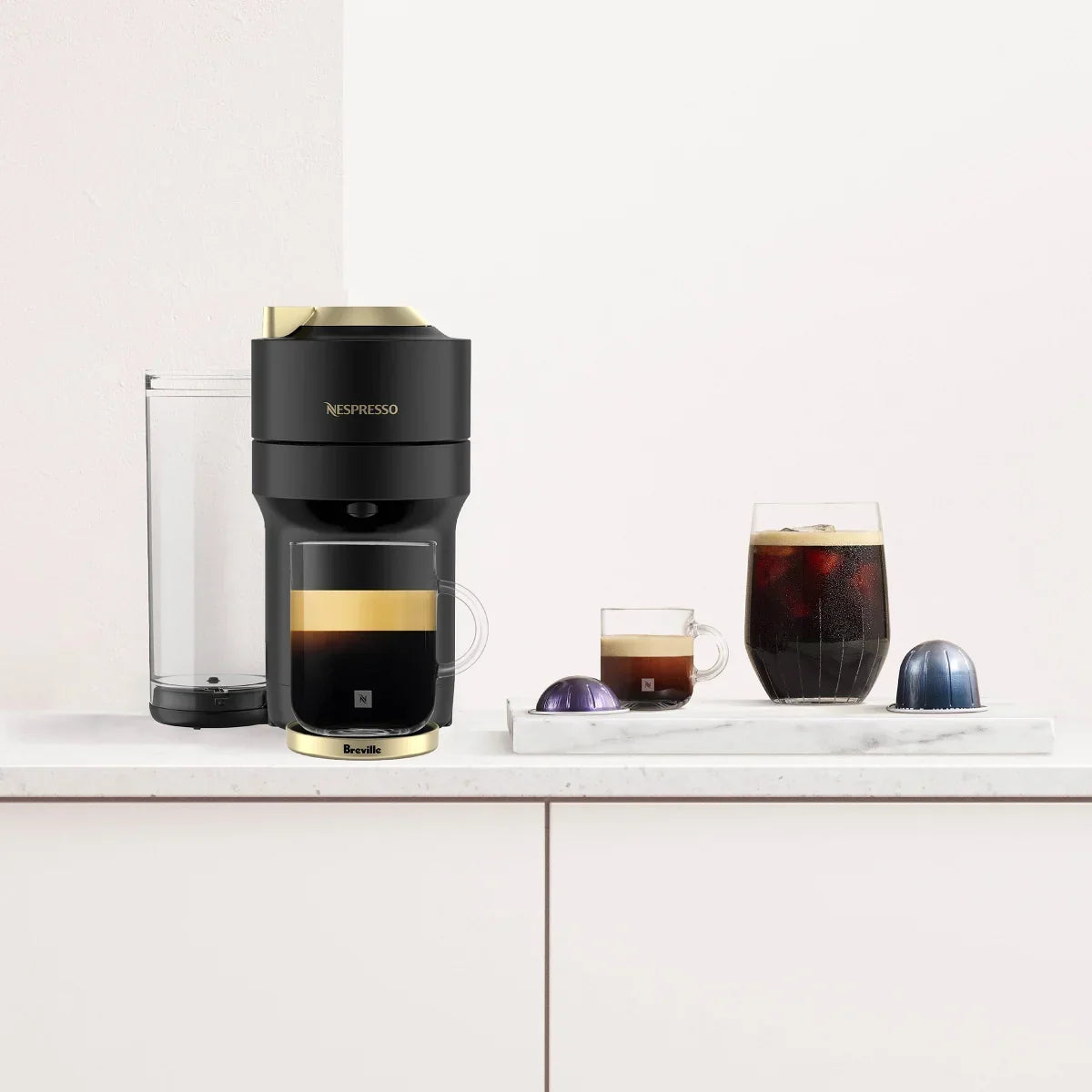 Vertuo Pop+ Deluxe Coffee and Espresso Machine by with Aeroccino with $25 Coffee Credit, Matte Black and Gold