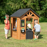 Children's playhouse cabin, equipped with a game kitchen, snack bar, half-door, toy phone, windows, flower pot stand and an operable doorbell, suitable for creative outdoor games.